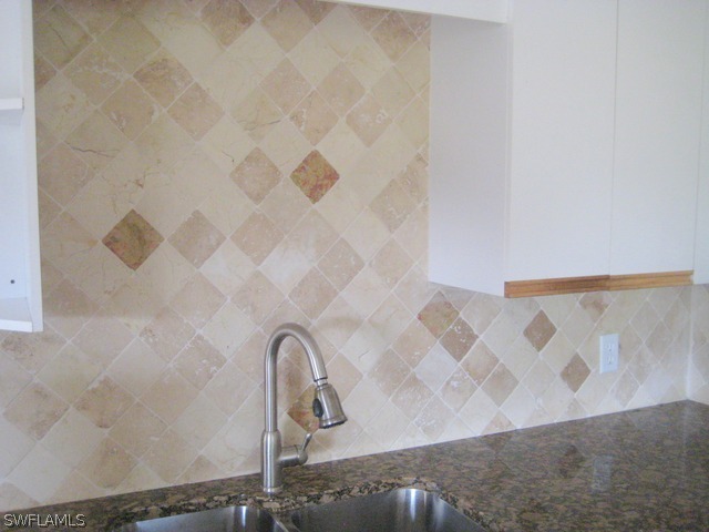 18229 Apple Road Fort Myers, FL 33967 - Photo 4 of 24 a close view of a shower in a bathroom