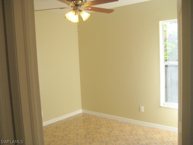18229 Apple Road Fort Myers, FL 33967 - Photo 9 of 24 a view of a closet in a room