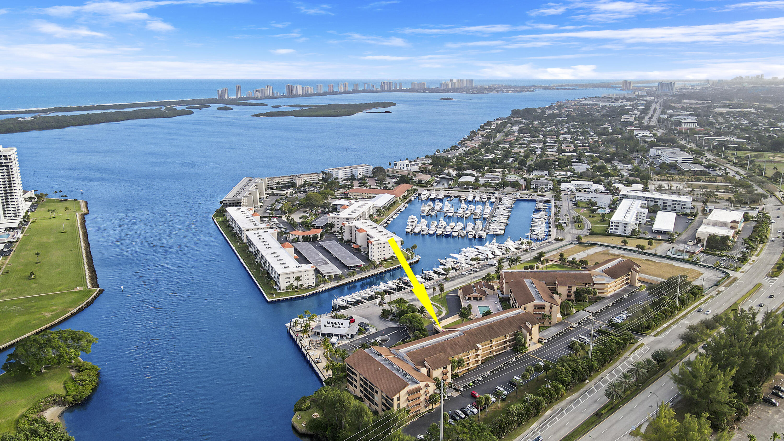 an aerial view of a house with a ocean view