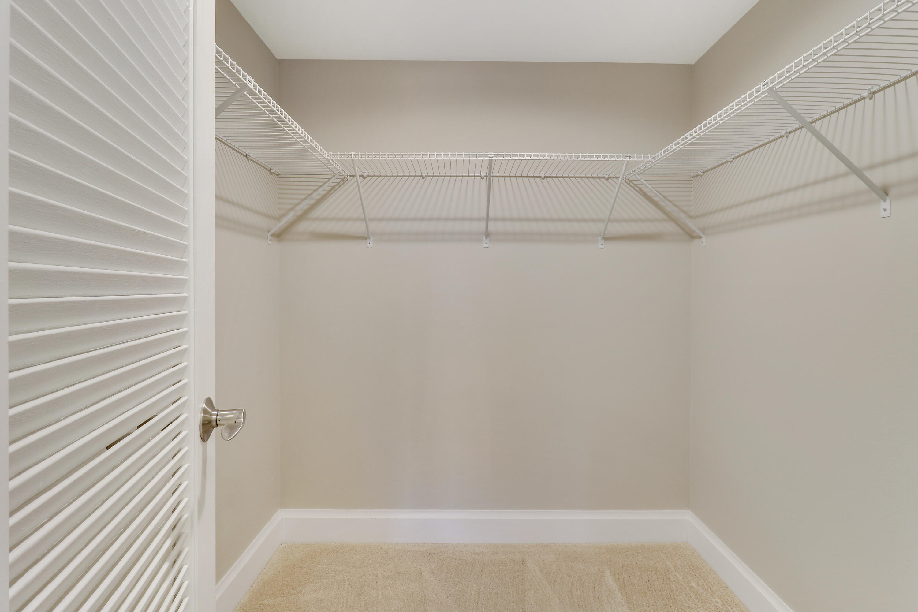 1036 Highway 1, Unit 321 North Palm Beach, FL 33408 - Photo 16 of 40 a view of a room with racks on the wall