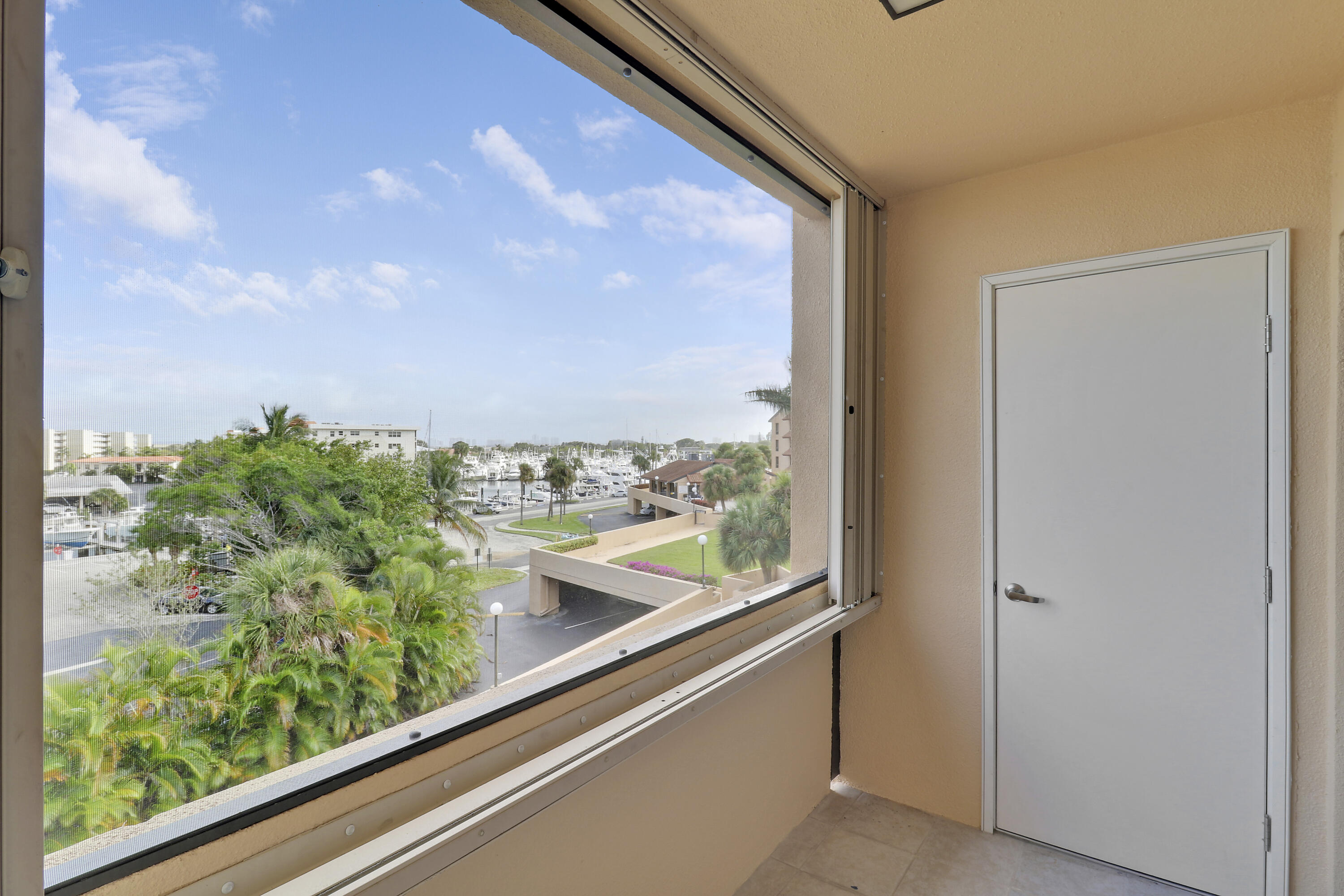 1036 Highway 1, Unit 321 North Palm Beach, FL 33408 - Photo 35 of 40 a view of a garden from a window