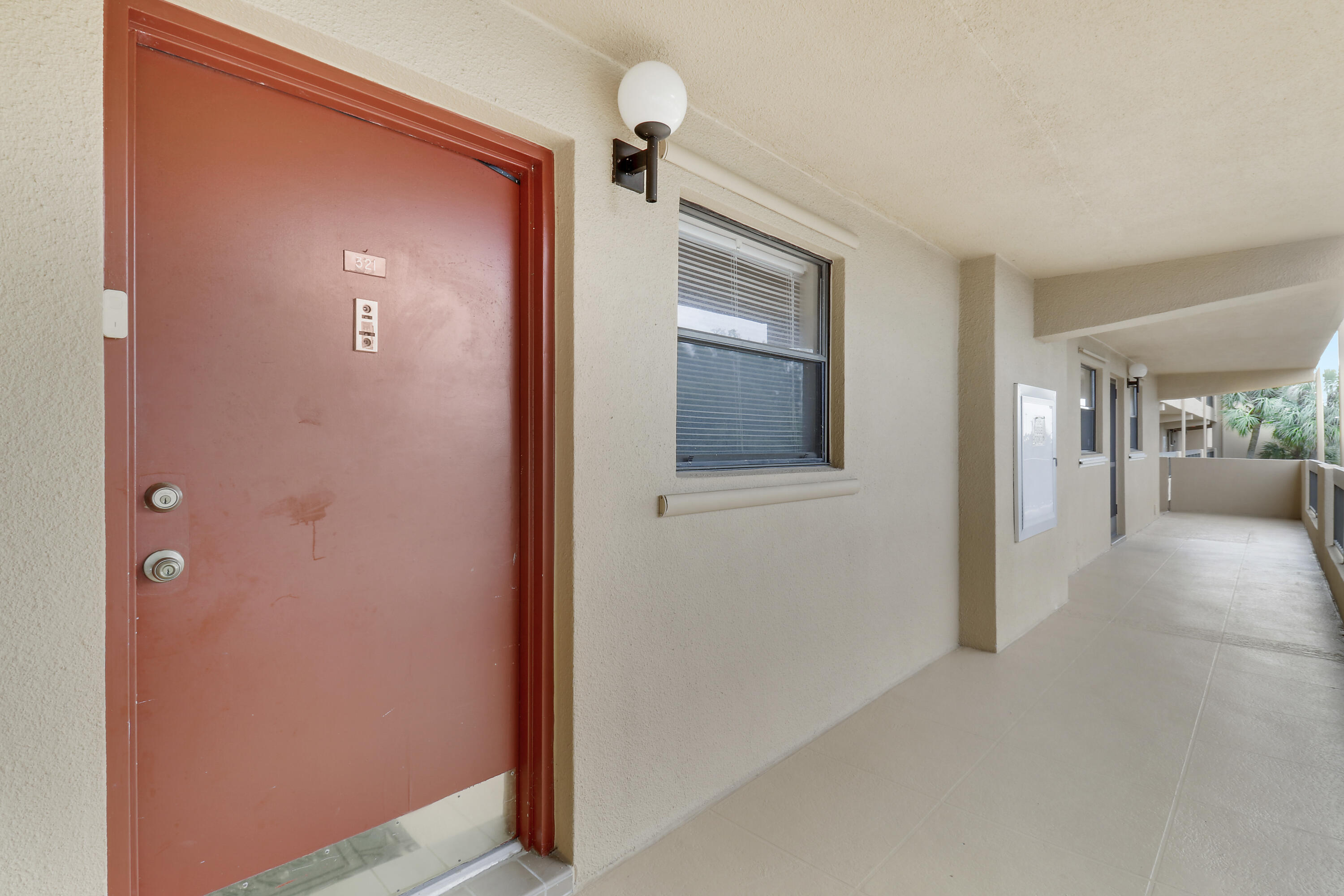 1036 Highway 1, Unit 321 North Palm Beach, FL 33408 - Photo 5 of 40 a view of a hallway with wooden floor