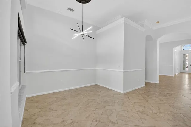 a view of a lake with a building in the background