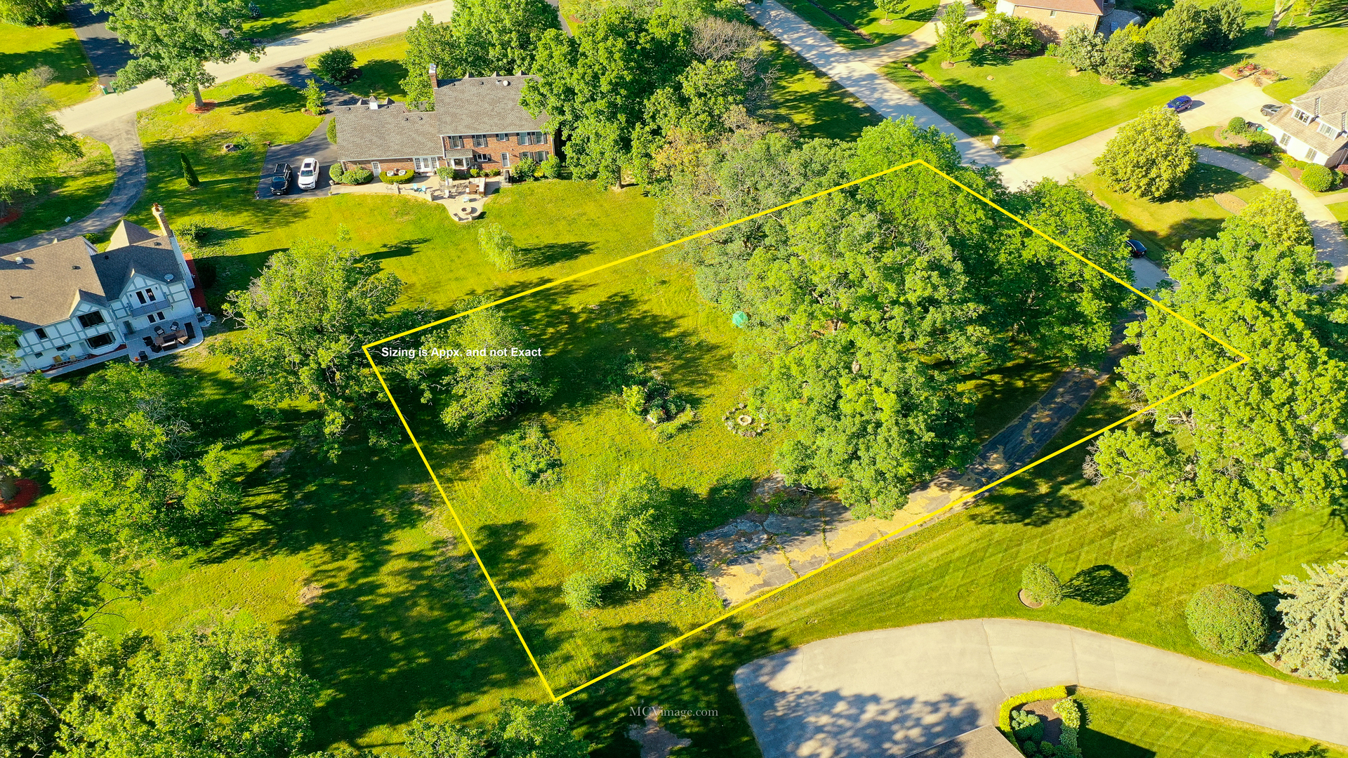 2 Paddock Lemont, IL 60439 - Photo 8 of 12 a view of a yard with plants