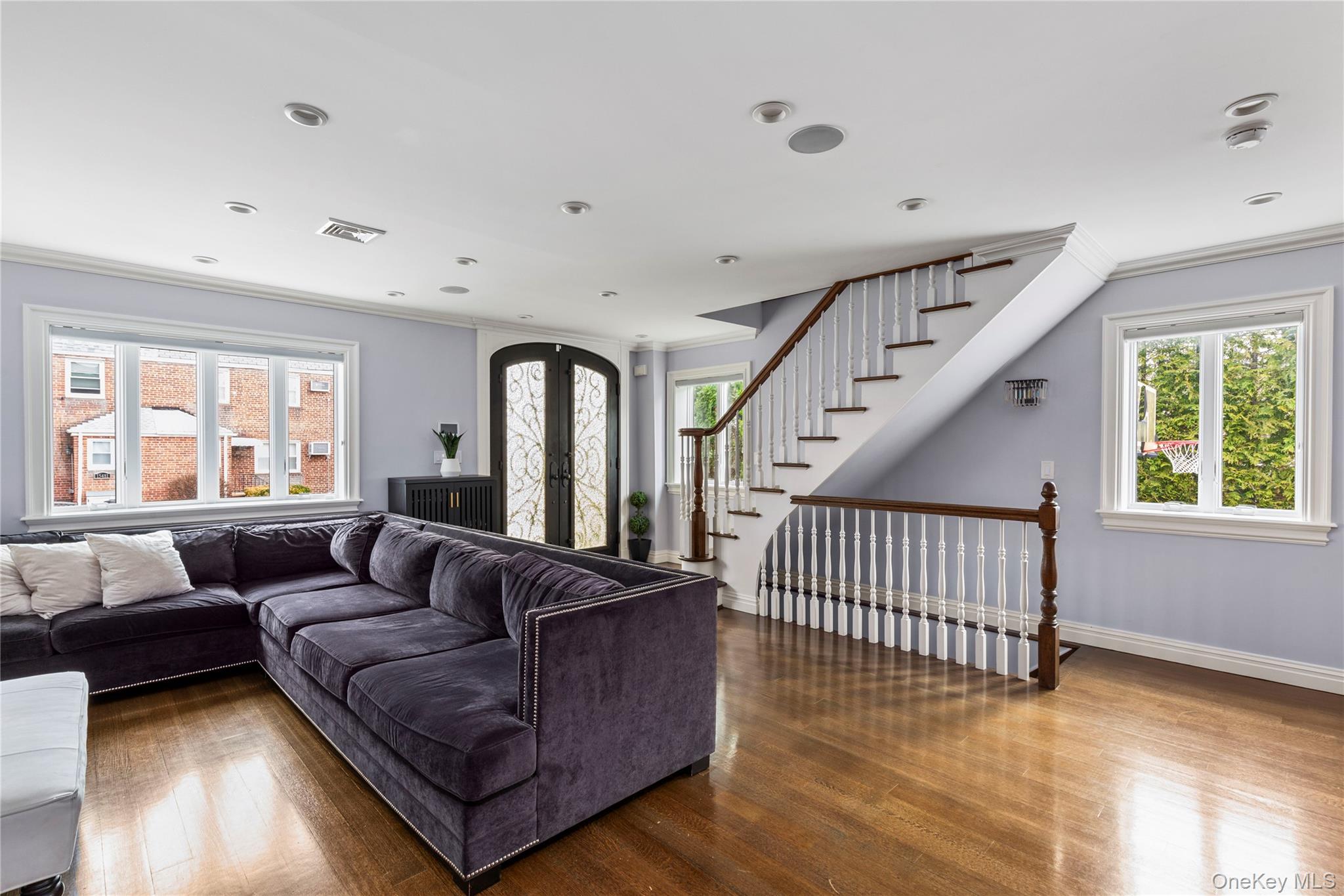 154-96 Riverside Drive Queens, NY 11357 - Photo 12 of 27 a living room with furniture and wooden floor