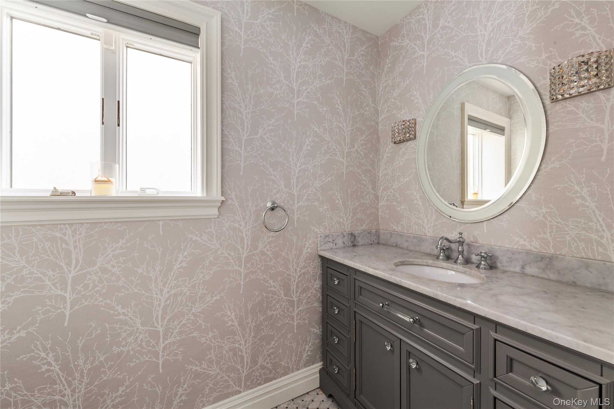 154-96 Riverside Drive Queens, NY 11357 - Photo 13 of 27 a bathroom with a sink a vanity and a mirror