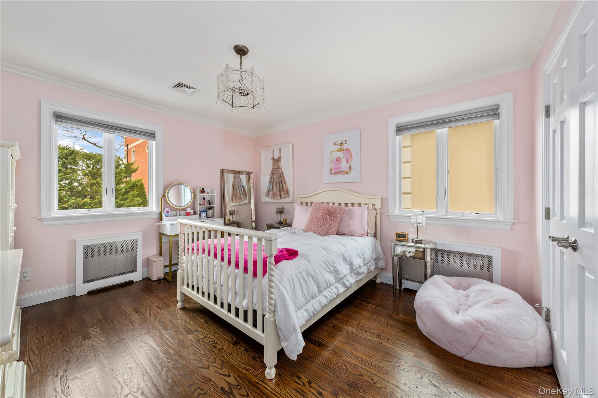 154-96 Riverside Drive Queens, NY 11357 - Photo 18 of 27 a bedroom with a bed and a window