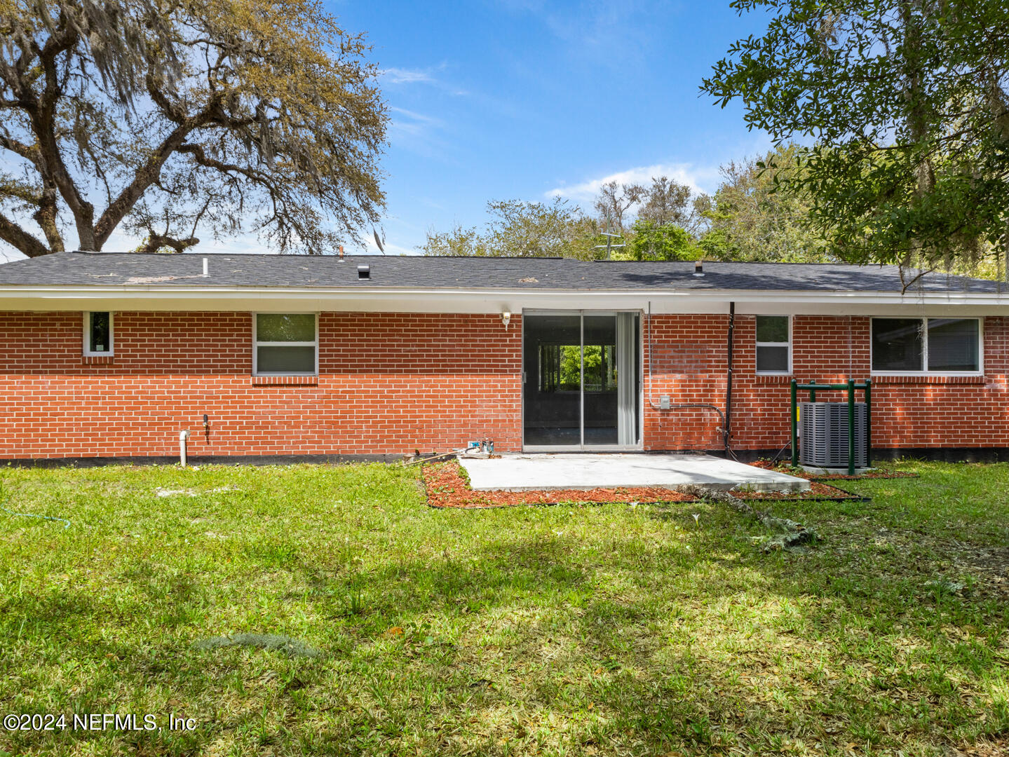 5142 Moncrief Road Jacksonville, FL 32209 - Photo 22 of 27 front view of a house with a yard