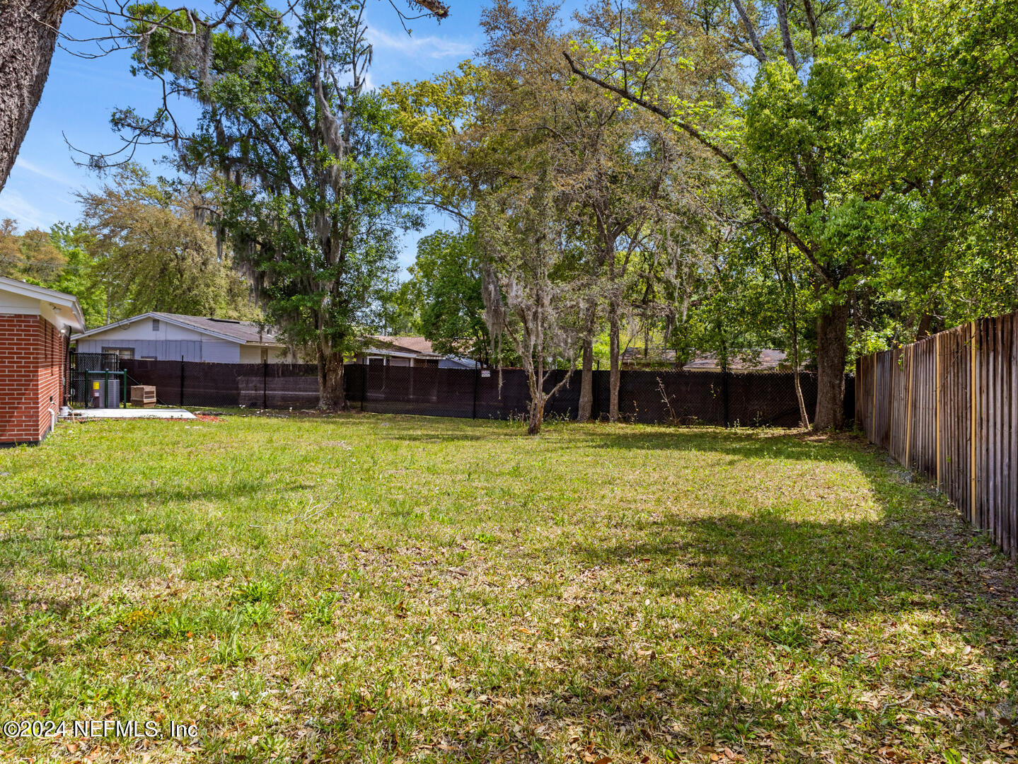 5142 Moncrief Road Jacksonville, FL 32209 - Photo 23 of 27 a front view of a house with a yard