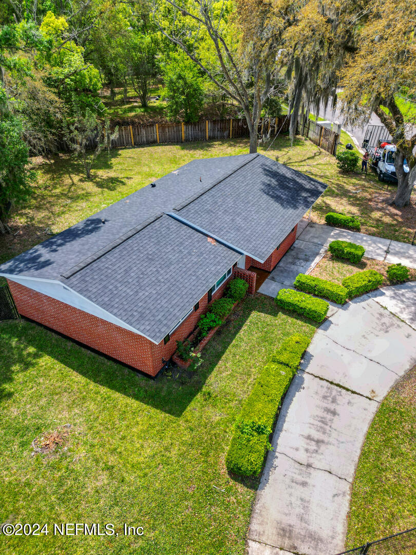 5142 Moncrief Road Jacksonville, FL 32209 - Photo 24 of 27 a view of a backyard with swimming pool