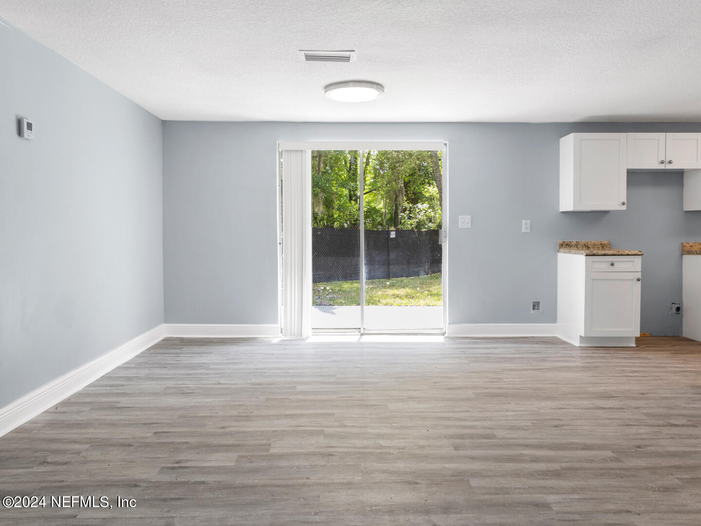 5142 Moncrief Road Jacksonville, FL 32209 - Photo 9 of 27 a view of an empty room with a window