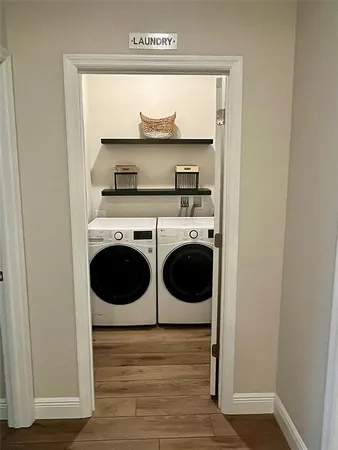 a utility room with dryer and washer