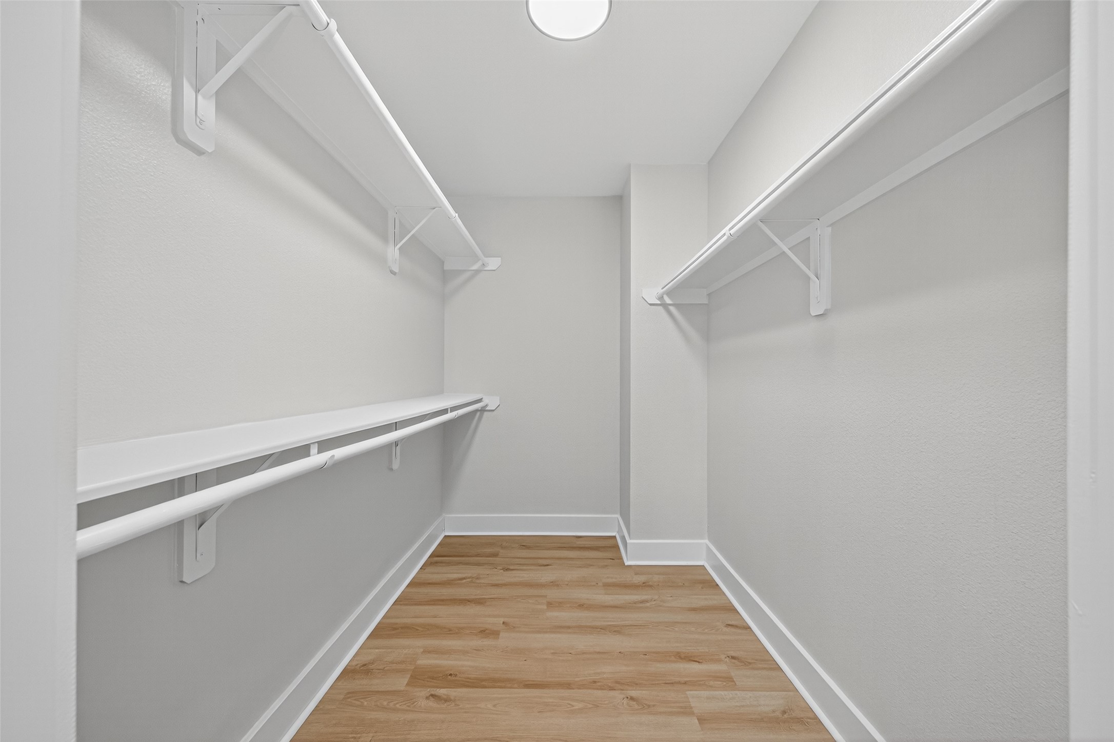 19515 Fletcher Way Drive Houston, TX 77073 - Photo 18 of 27 a view of an empty walk in closet