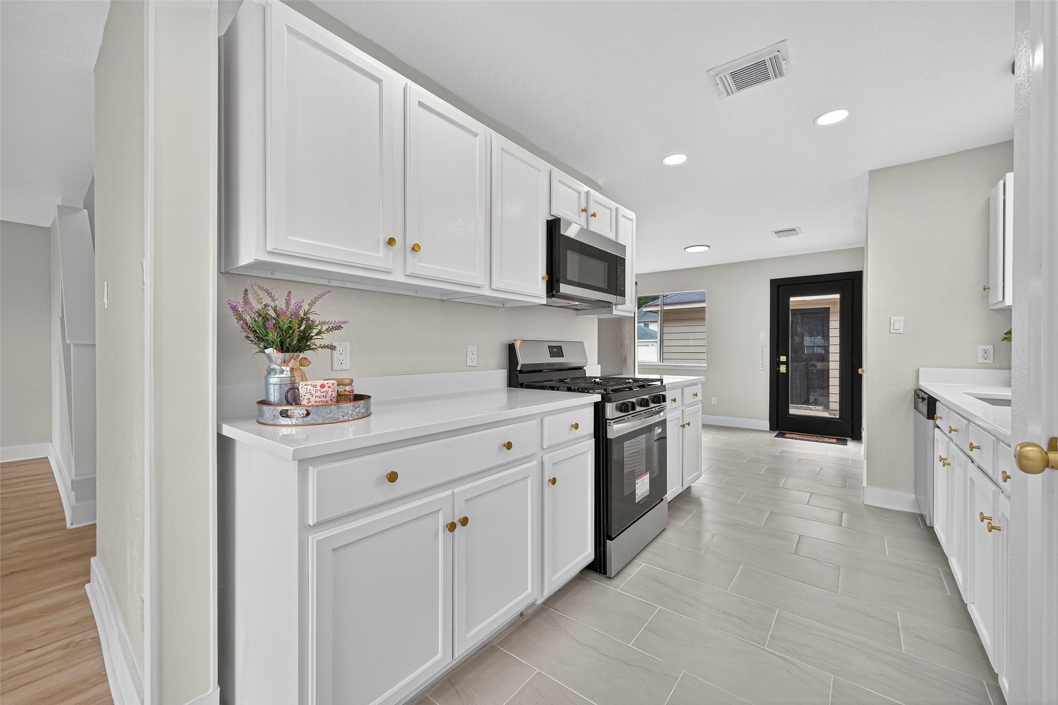 19515 Fletcher Way Drive Houston, TX 77073 - Photo 7 of 27 a kitchen with stainless steel appliances granite countertop a refrigerator and a stove top oven