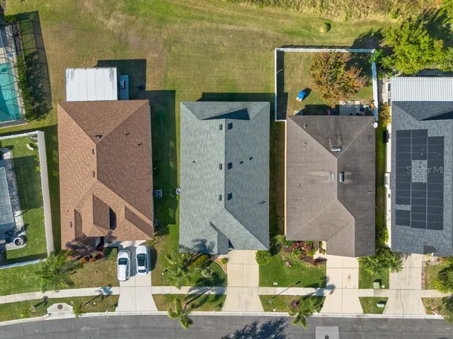 aerial view of a house with a garden