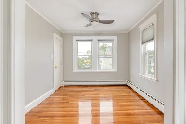 a view of an empty room with a window