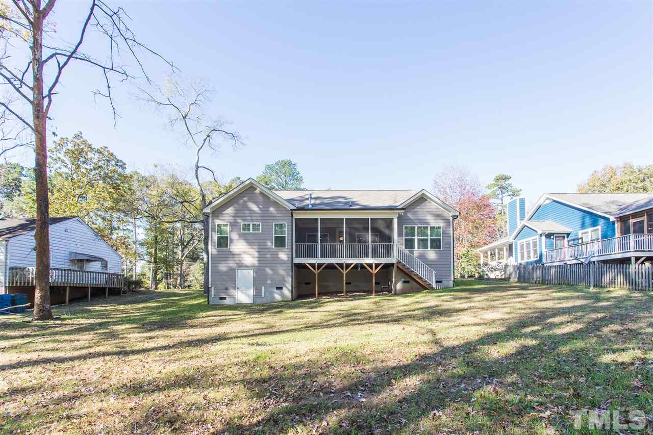 3135 Dixon Road Durham, NC 27707 - Photo 27 of 29 Deep lot offers cleared space AND area with hardwood trees.
