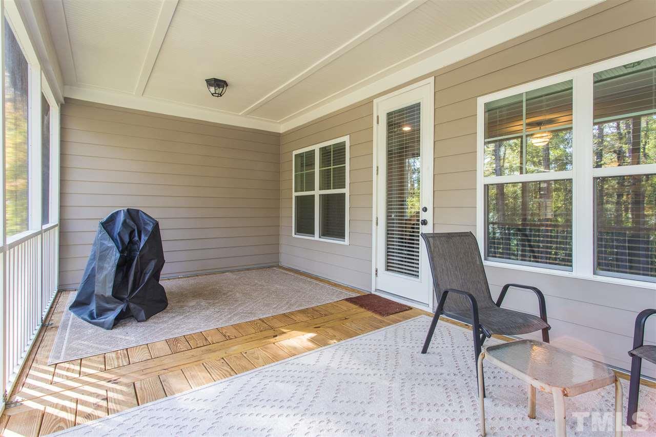 3135 Dixon Road Durham, NC 27707 - Photo 29 of 29 Screened-in deck overlooks large backyard.
