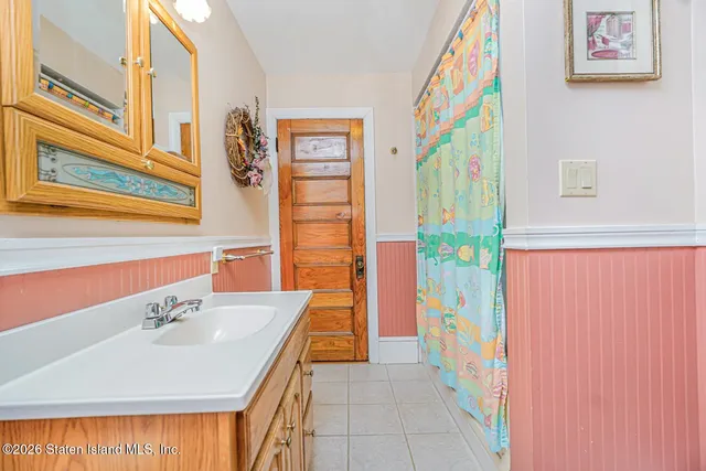 a bathroom with a toilet and a sink