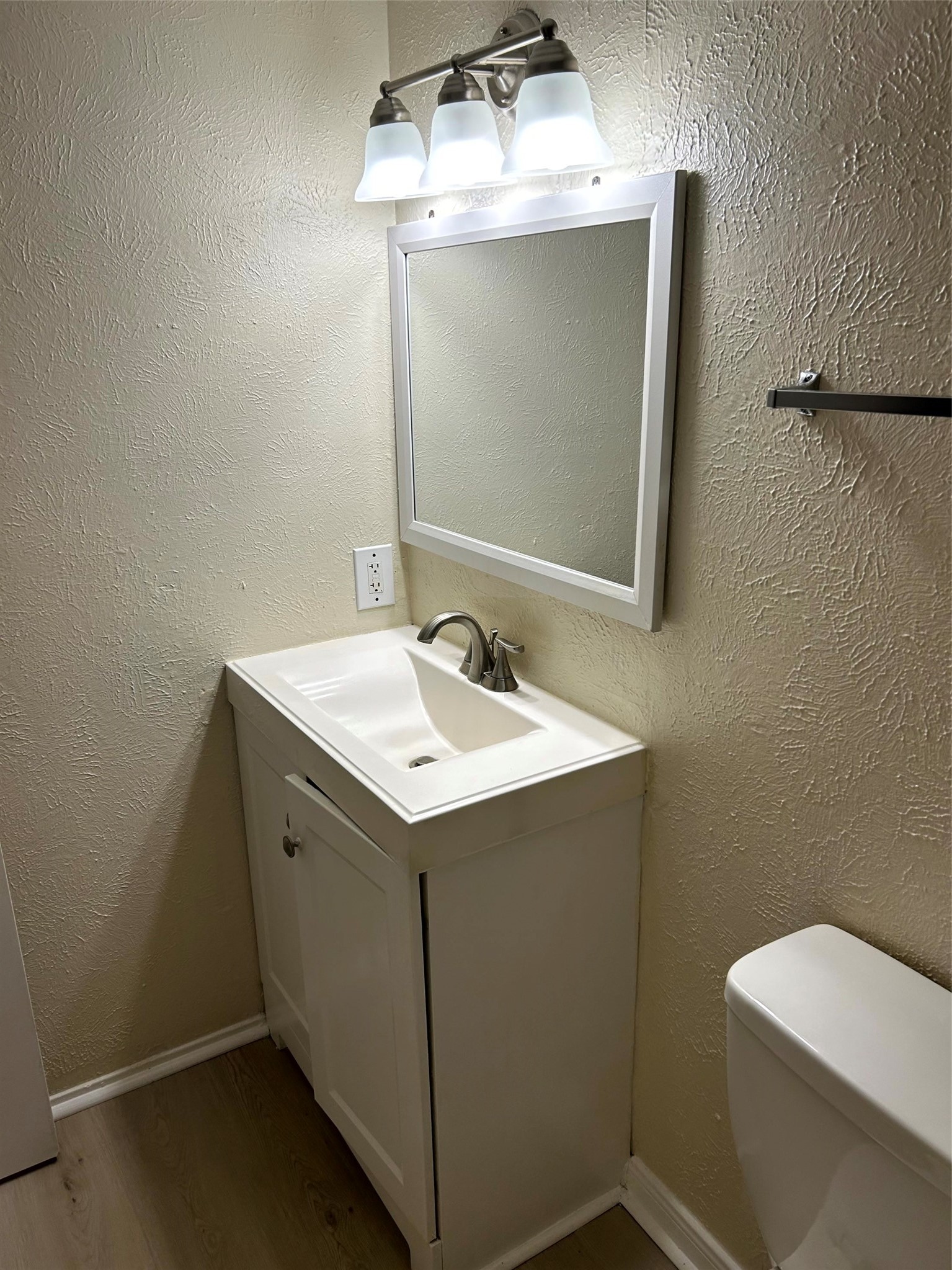 5018 Ridgecreek Drive Houston, TX 77053 - Photo 12 of 18 a bathroom with a sink and mirror