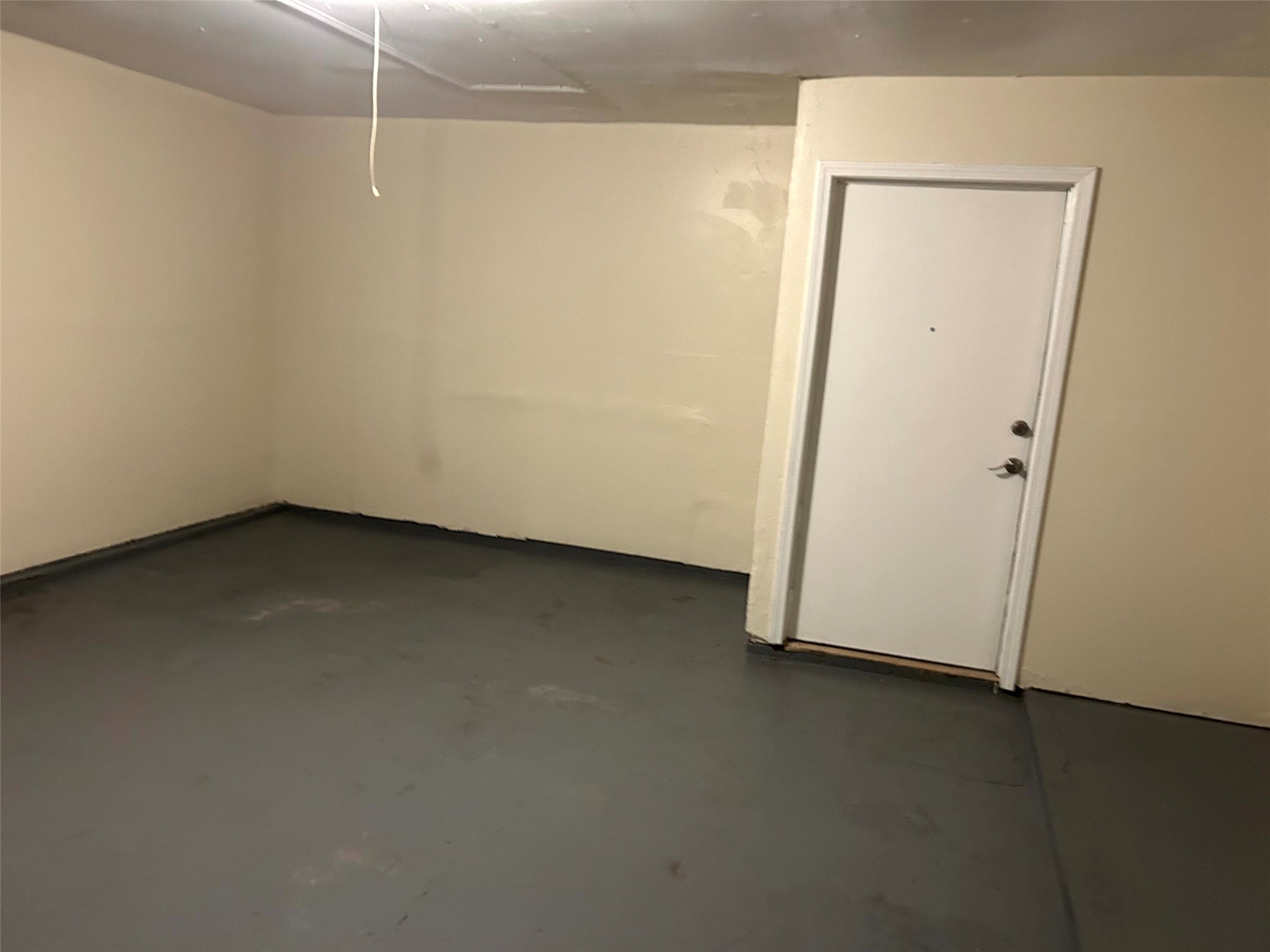 5018 Ridgecreek Drive Houston, TX 77053 - Photo 14 of 18 an empty room with a door