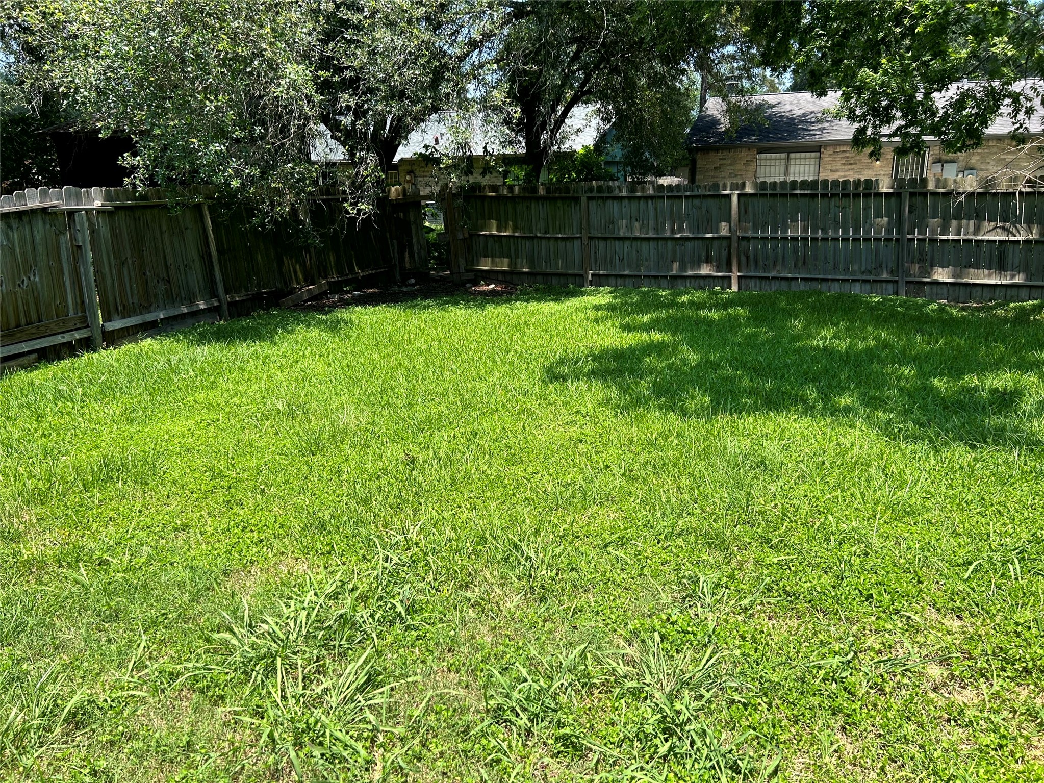 5018 Ridgecreek Drive Houston, TX 77053 - Photo 15 of 18 a view of garden with wooden fence