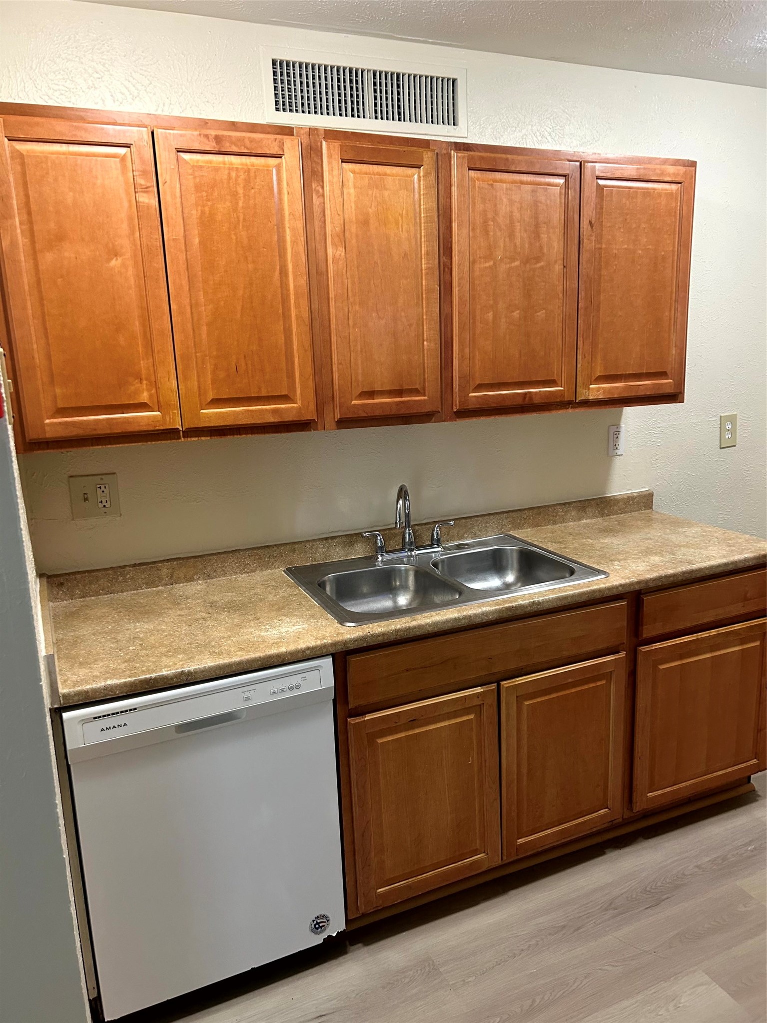 5018 Ridgecreek Drive Houston, TX 77053 - Photo 4 of 18 a kitchen with granite countertop cabinets sink and washing machine