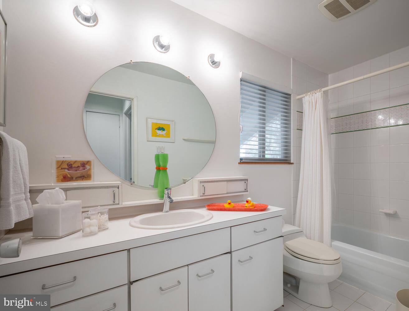 6908 Persimmon Tree Road Bethesda, MD 20817 - Photo 49 of 60 Upstairs hall bathroom