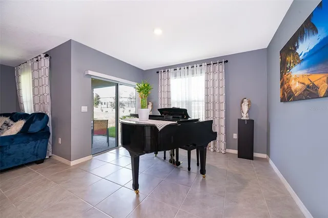 a living room with furniture and a window