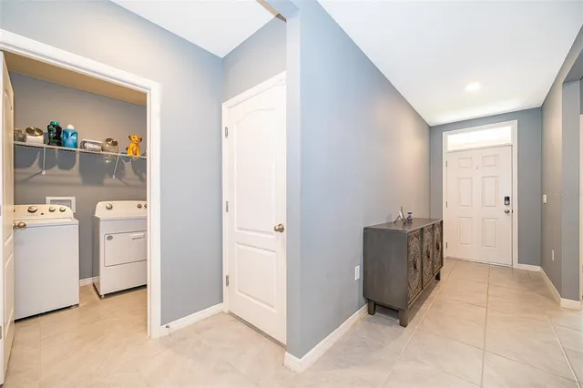 a view of kitchen and utility room