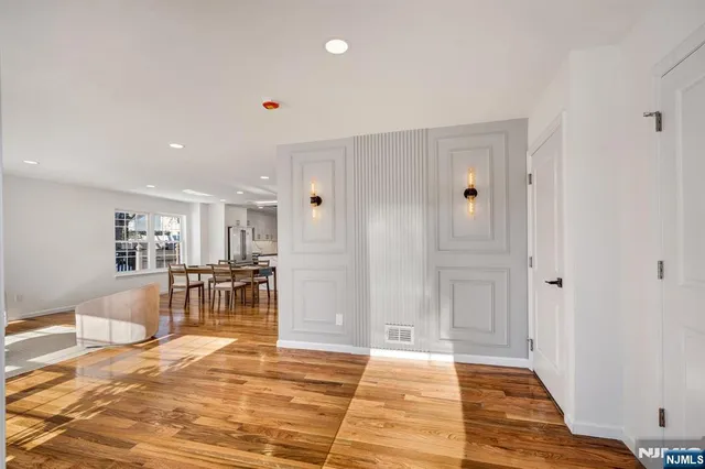 a view of a livingroom with furniture and windows