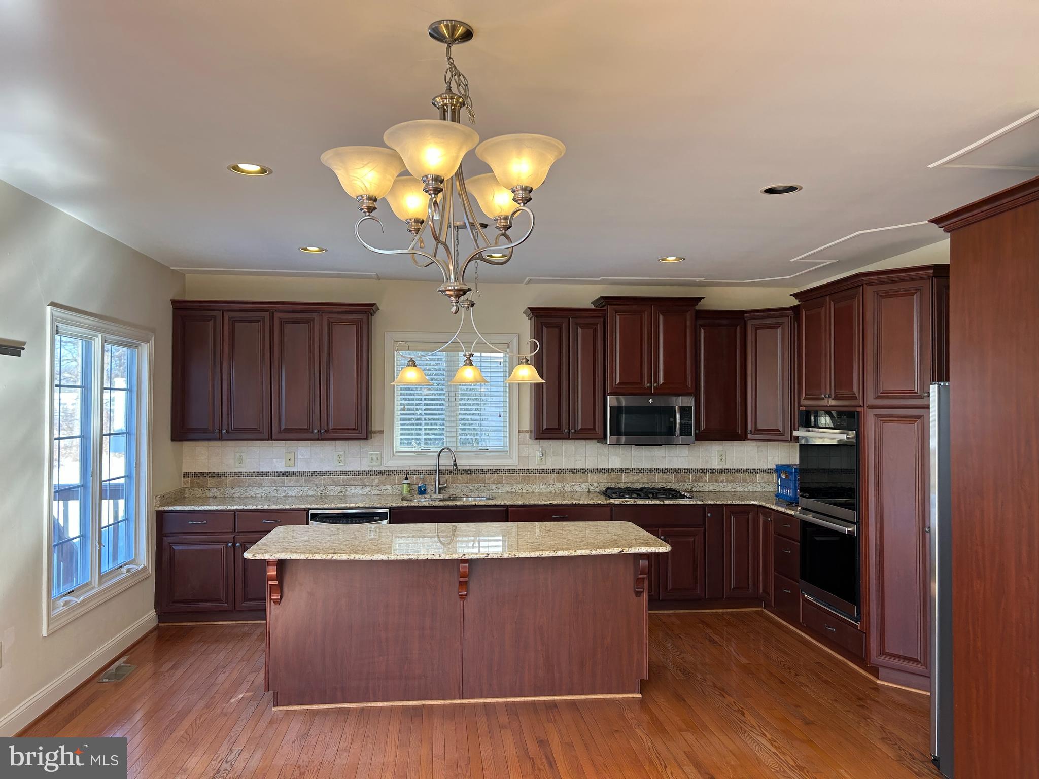 310 Waynebrook Drive Chester Springs, PA 19425 - Photo 15 of 39 a view of kitchen with cabinets and wooden floor