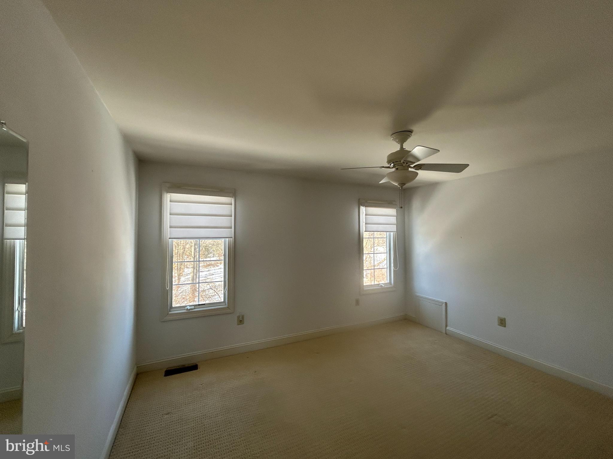 310 Waynebrook Drive Chester Springs, PA 19425 - Photo 22 of 39 a view of empty room with windows