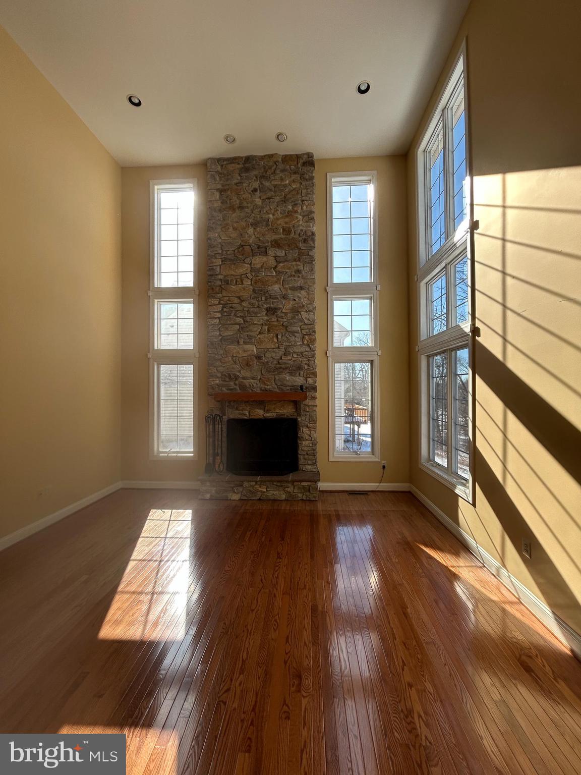 310 Waynebrook Drive Chester Springs, PA 19425 - Photo 27 of 39 a view of an empty room with wooden floor and a window