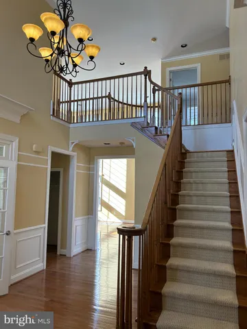 a view of entryway with wooden floor