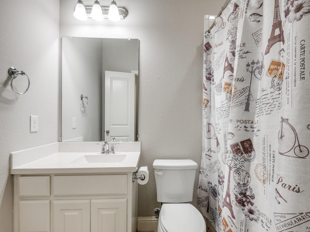 1313 Torrington Lane Forney, TX 75126 - Photo 25 of 40 a bathroom with a sink toilet and shower