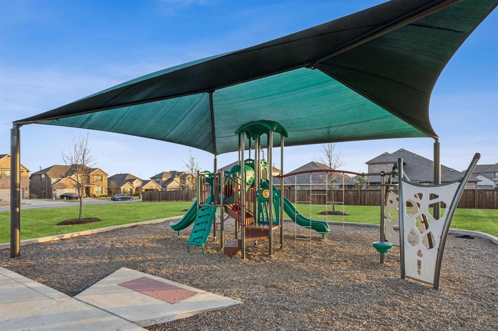 1313 Torrington Lane Forney, TX 75126 - Photo 36 of 40 a view of a park with slide