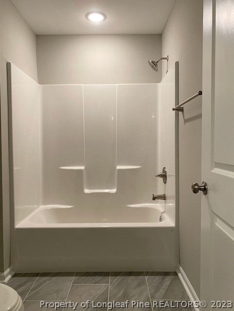 411 B & B Loop Road Raeford, NC 28376 - Photo 25 of 47 a bathroom with a bathtub and a shower