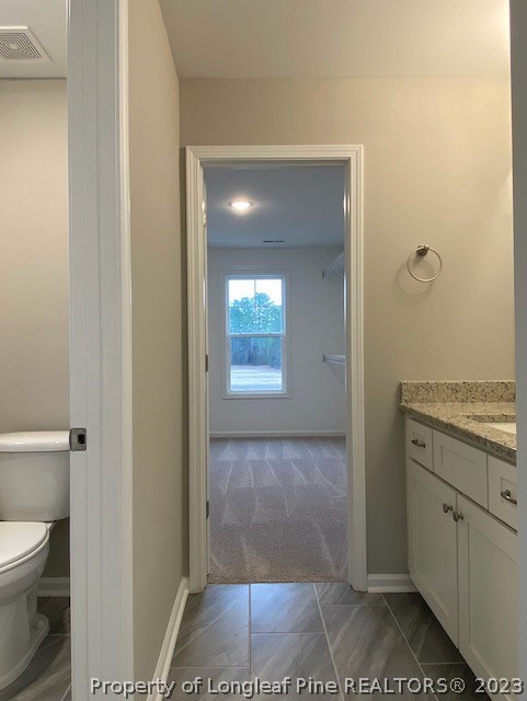 411 B & B Loop Road Raeford, NC 28376 - Photo 35 of 47 a bathroom with a granite countertop sink and a mirror