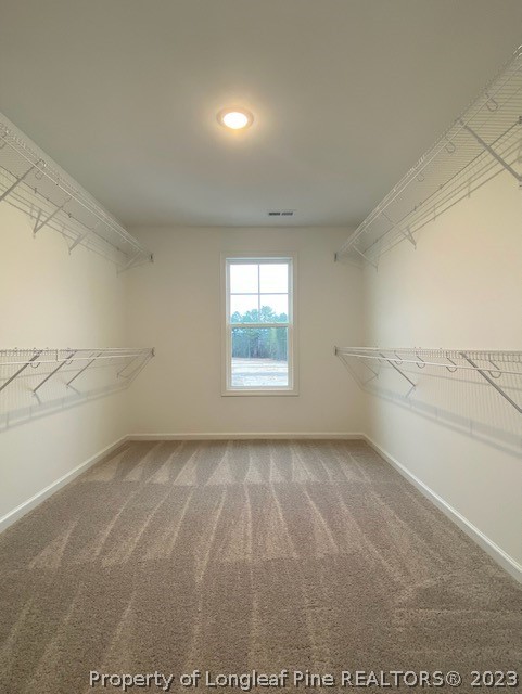 411 B & B Loop Road Raeford, NC 28376 - Photo 37 of 47 a view of a livingroom with an empty space and window