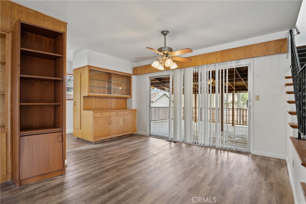 403 Ash Street Chico, CA 95928 - Photo 14 of 52 a view of a kitchen with wooden floor and a ceiling fan