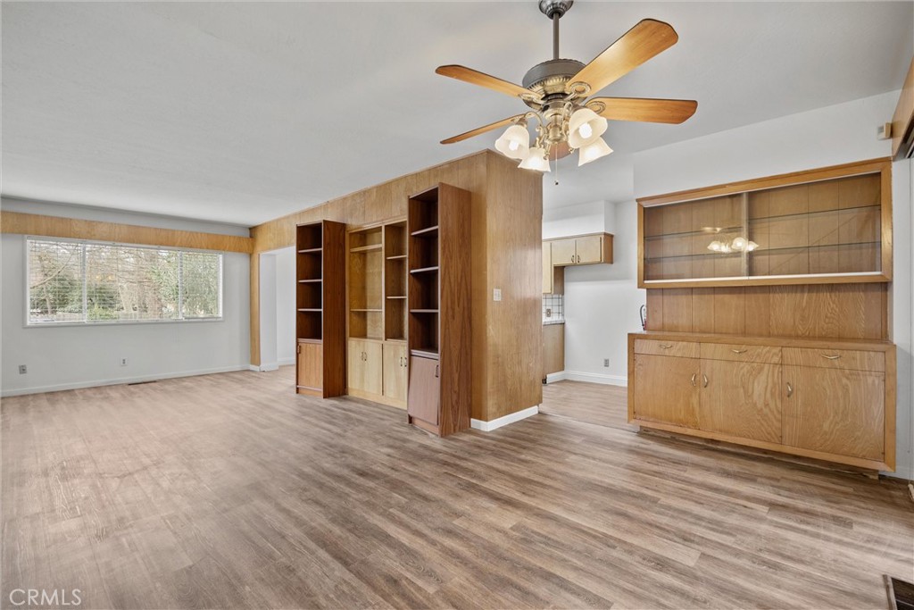 403 Ash Street Chico, CA 95928 - Photo 15 of 52 a view of an empty room with a window and wooden floor