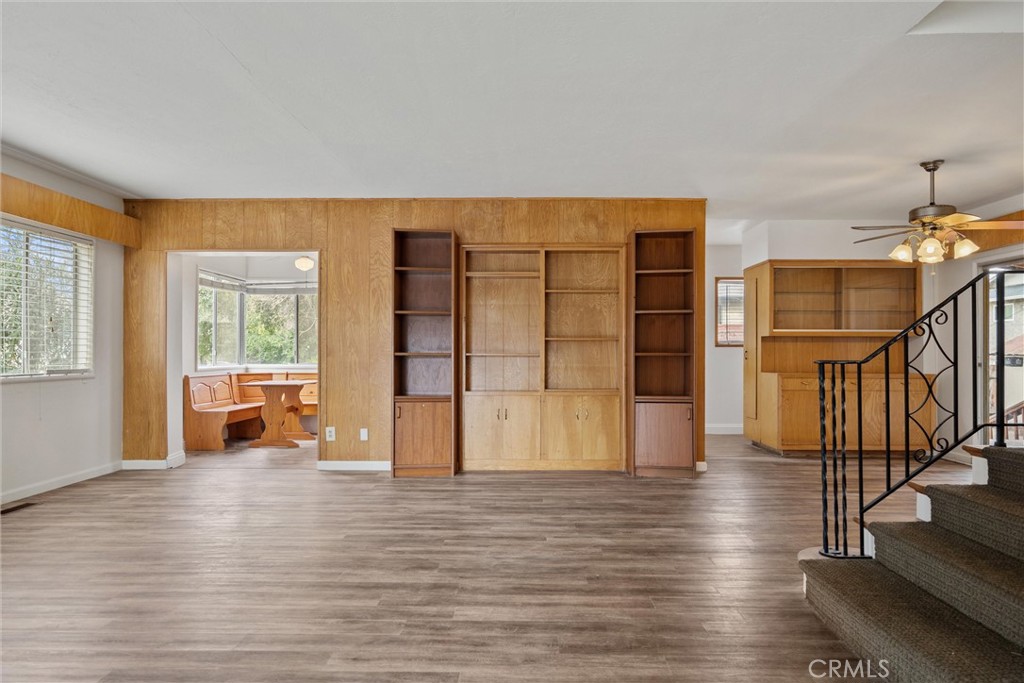 403 Ash Street Chico, CA 95928 - Photo 16 of 52 a view of empty room with wooden floor and floor to ceiling window