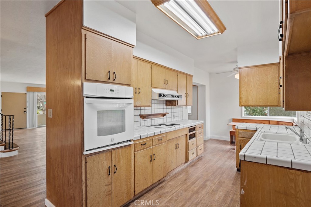 403 Ash Street Chico, CA 95928 - Photo 22 of 52 a open kitchen with stainless steel appliances granite countertop a stove and a sink