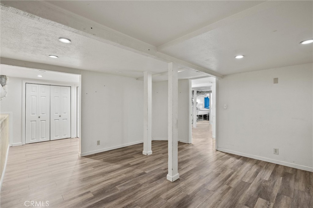403 Ash Street Chico, CA 95928 - Photo 32 of 52 a view of a hallway with wooden floor