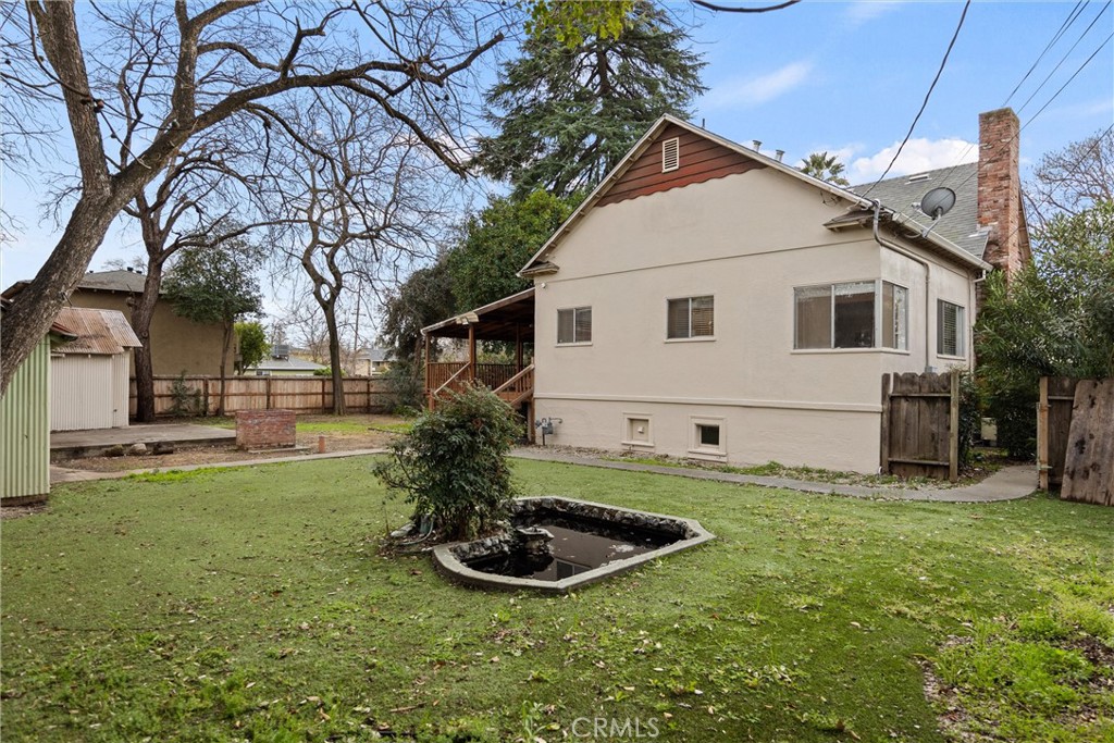 403 Ash Street Chico, CA 95928 - Photo 44 of 52 a front view of house with yard and green space