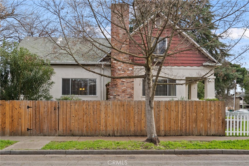 403 Ash Street Chico, CA 95928 - Photo 48 of 52 a front view of a house with a garden