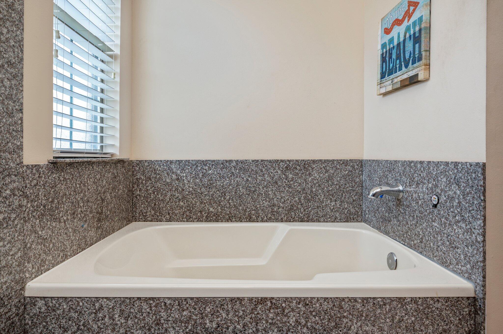 5231 Moore Loop Crestview, FL 32536 - Photo 21 of 45 a bathroom with a bathtub