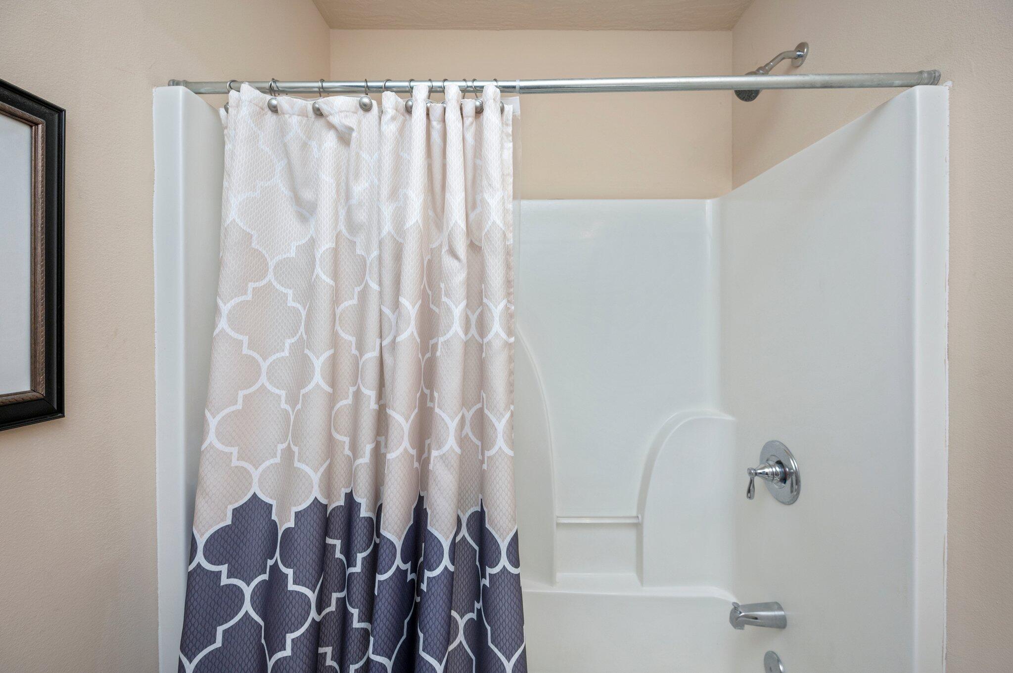 5231 Moore Loop Crestview, FL 32536 - Photo 29 of 45 a bathroom with a shower and a curtain