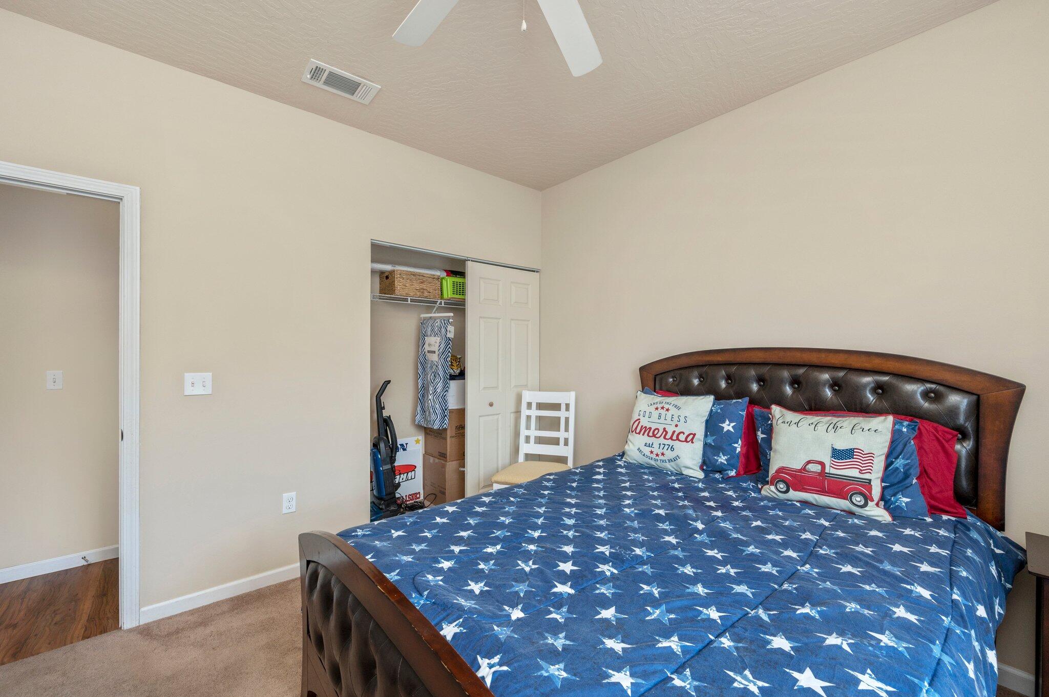 5231 Moore Loop Crestview, FL 32536 - Photo 32 of 45 a bedroom with a bed and dresser